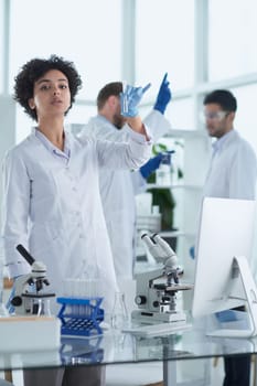 Scientists smiling together in lab