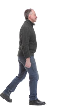 Back view of going handsome man in jeans. Isolated over white background.