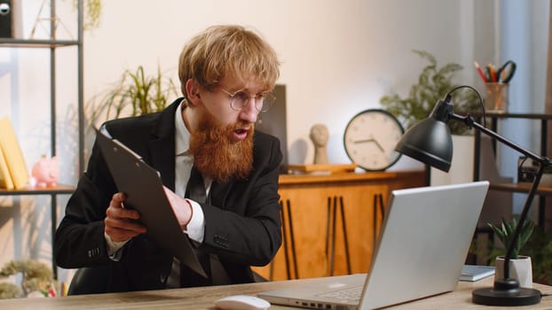 Conflict Quarrel Negotiation. Angry businessman ceo making webcam laptop online video call at office. Upset mad freelancer man talking colleague conversation analyzing financial report mistake problem