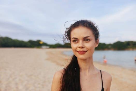 person woman beach sunset ocean sand lifestyle peaceful running leisure sun young smile vacation outdoor nature summer relax sea jean happiness