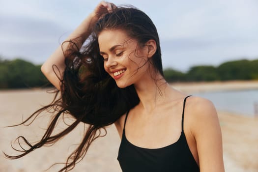 summer woman smile beautiful happiness beauty person relax young freedom tropical ocean enjoyment sand vacation nature sunlight sea lifestyle sunset beach