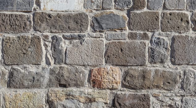 Part of old castle stone wall texture background. High quality photo