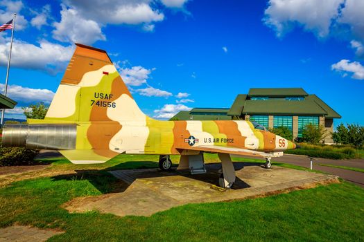 McMinnville, Oregon - August 31, 2014: Fighter aircraft Northrop F-5E Tiger II with desert strip on exhibition at Evergreen Aviation & Space Museum.