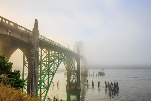 Large old bridge over Yaquina Bay at Newport, Oregon on the central Oregon coast, along Hwy 101.