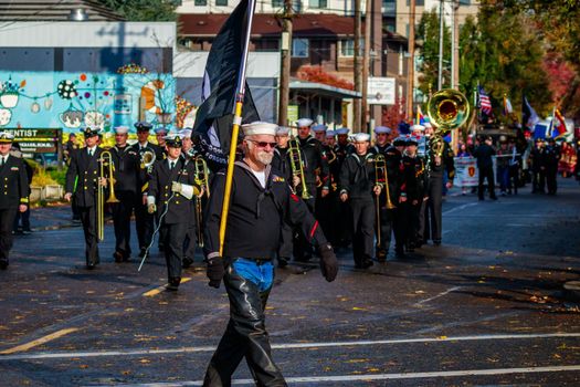 Portland, Oregon, USA - November 11, 2015: People march in the annual Ross Hollywood Chapel Veterans Day Parade, in northeast Portland.