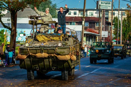 Portland, Oregon, USA - November 11, 2015: People march in the annual Ross Hollywood Chapel Veterans Day Parade, in northeast Portland.