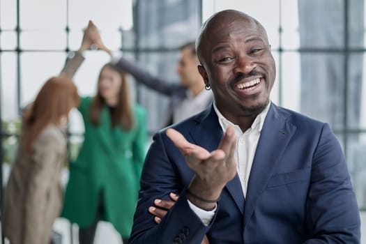 cheerful cheery imposing guy agent broker banker holding copy space on palms