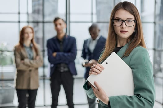 executive manager employer introducing welcoming newcomer to workmates.