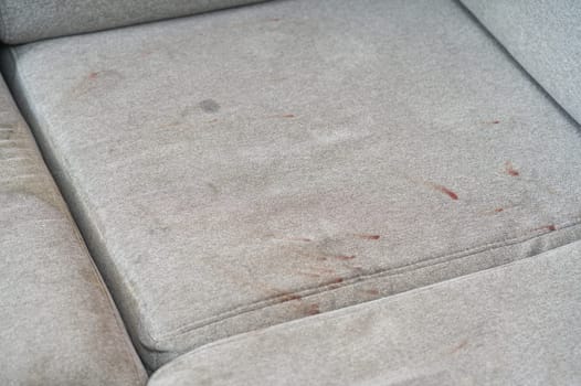 Dirty, stain, blot , fleck of water on the fabric, textile sofa. Dirty textile sofa chemical cleaning Dirty textile sofa chemical cleaning. upholstered furniture cleaning concept