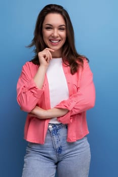 portrait of a dreamy cute brunette young woman in a stylish image in the studio.