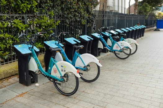 ISTANBUL, TURKEY - MAY 22, 2022:Public parking of rental bicycles in the city