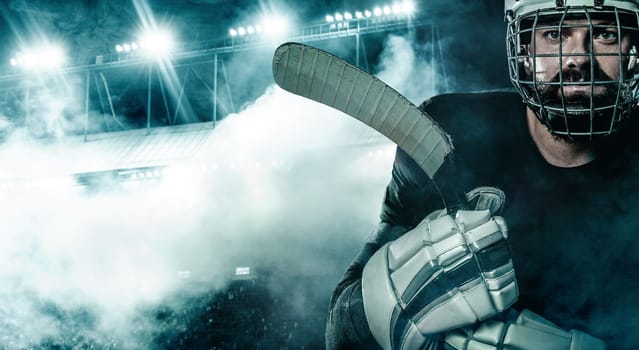 Hockey player in the mask on stadium.