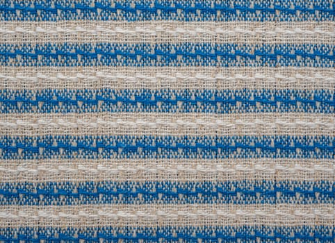 Abstact pattern. fabric texture background with horizontal stripes of blue, grey and white . flax natural fabric. Ornament on linen towel.