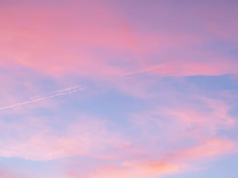 Fresh air, weather concept. Soft, fluffy and colorful cloud formation. Abstract idyllic pink and blue sky. Blur background texture of colorful sunset clouds. Twilight sky.