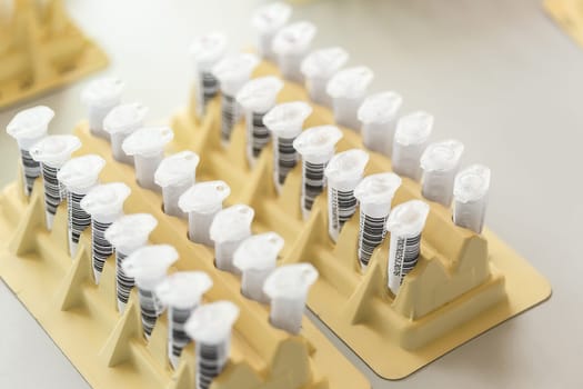 Test tubes arranged on medical trolley. Medical research