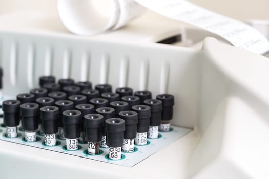 Test tubes arranged on medical trolley. Medical research