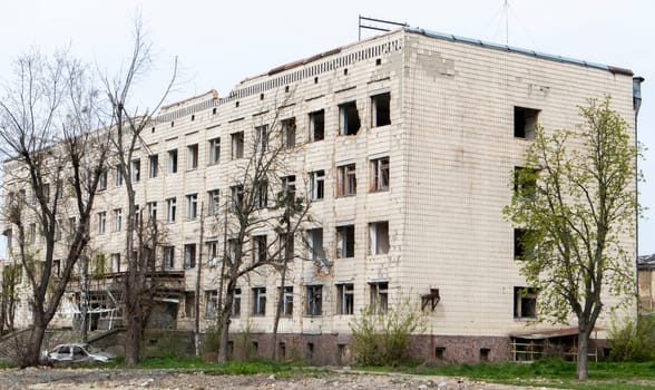 Consequences of the war in the capital of Ukraine. A bombed-out building damaged by shells after an airstrike. The rocket blew up the house. Holes in the walls from shells