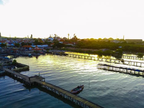 Aerial top down on traditional colourful asian fisherman boats moored in Gresik, Indonesia. Drone Photography. Aerial Photography.