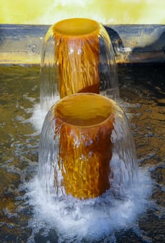 Original fountain, water pouring upward from a pipe in a park in New Jersey