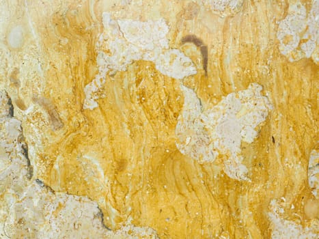 yellow color wall marble background. Golden stone texture.
