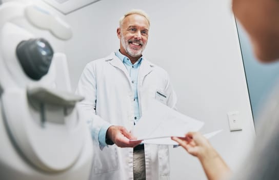 Ophthalmology, consulting and doctor with a patient for results, vision help and surgery information. Healthcare, communication and mature ophthalmologist talking to a woman about advice on eyes.