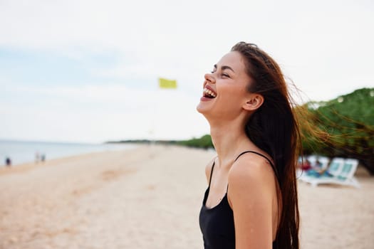 adult woman copy ocean walking vacation summer space free long beauty happy sky smile sea beach young sand hair sunset running smiling nature