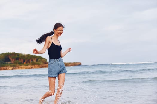 sand woman sunset beautiful sea nature travel hair beach lifestyle smile running walking summer female girl young happiness activity sunrise smiling