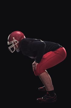 Soccer player on a dark background in vintage style. The classic American game. college Students. player game first before the attack