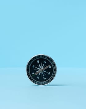 Round compass on a blue background