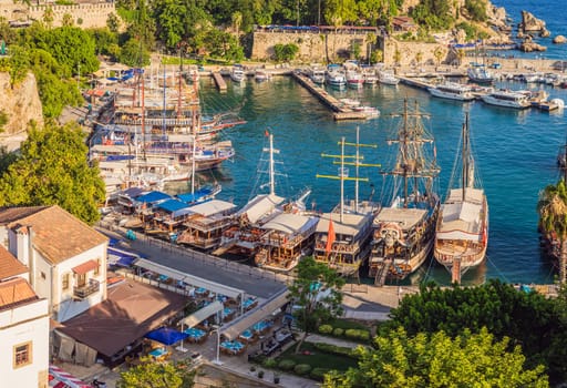 Old town Kaleici in Antalya. Panoramic view of Antalya Old Town port, Taurus mountains and Mediterrranean Sea, Turkey.