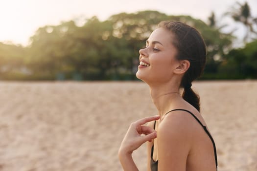 woman beach freedom enjoyment beautiful smile sea leisure sun sky space summer happy lifestyle vacation outdoor travel beauty sand sunset ocean copy