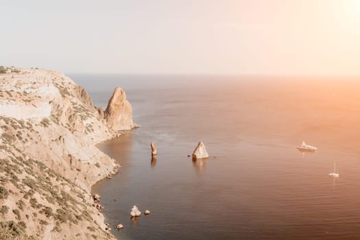 Aerial panoramic view of beautiful sunset above sea. Beautiful seascape. Sun glare, small waves on the water surface. Evening. Horizon. Nobody. No people. Copy space. Never-ending beauty of nature