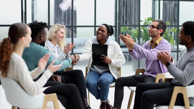 business training and coaching in the company. people sit and chat