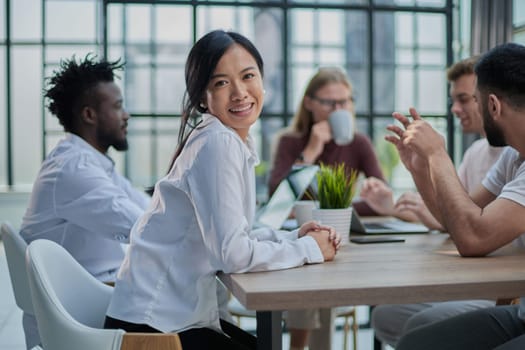 Multi-ethnic group of architects in a meeting