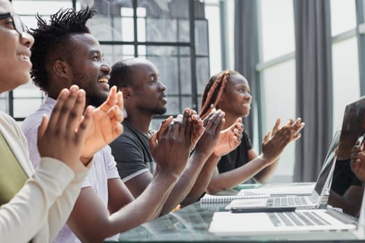 african american business team applaus in office