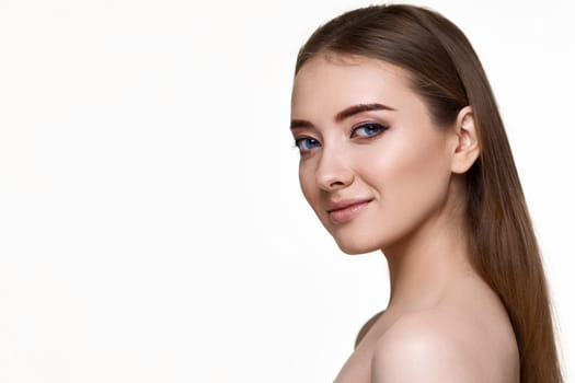 profile of beautiful young woman with perfect skin on white background. copy space