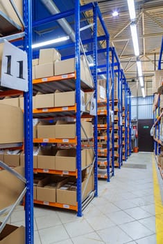 High racks in the warehouse of goods. High quality photo