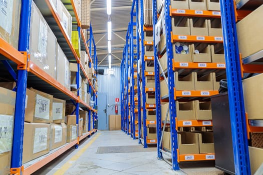 High racks in the warehouse of goods. High quality photo