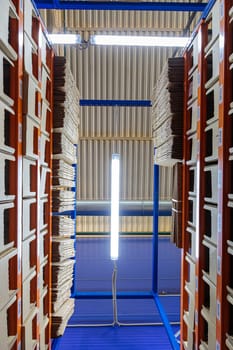 High racks in the warehouse of goods. High quality photo