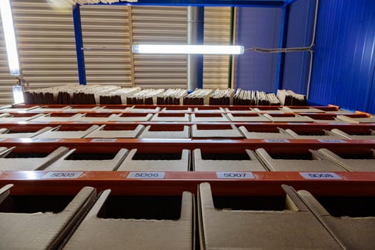 Boxes on racks in a warehouse of goods close-up. High quality photo