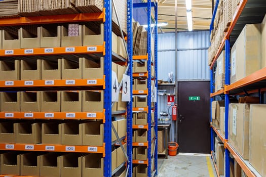High racks in the warehouse of goods. High quality photo
