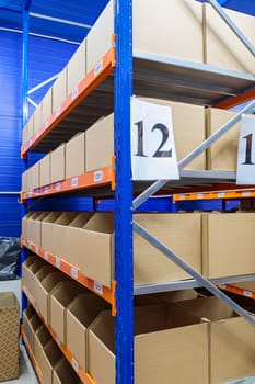 High racks in the warehouse of goods. High quality photo
