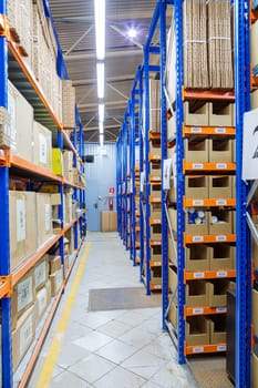 High racks in the warehouse of goods. High quality photo