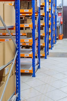 High racks in the warehouse of goods. High quality photo