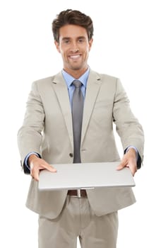 The technology is in your hands...Studio shot of a young businessman holding a laptop isolated on white