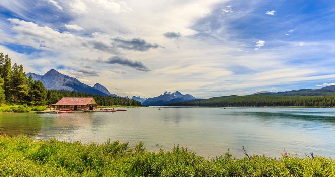 Valemount, BC Canada - AUGUST 10, 2014: The historic Curly Philips Boathouse on Maligne Lake, in Jasper National Park