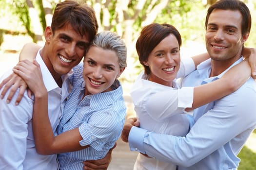 Couples retreat. two happy young couples standing together outside