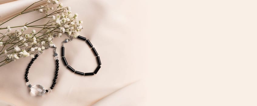 Bracelets made of natural stones. natural mineral texture of the necklace. The background is blurred. not everything is in focus.