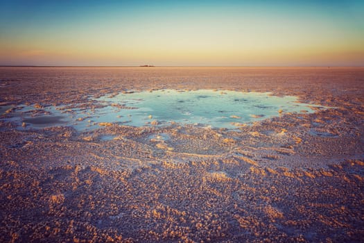 Bubbling pond in the salt plains of Asale Lake in the Danakil Depression in Ethiopia in Africa.