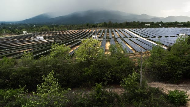 Top view on photovoltaic solar power panels. Drone aerial view of Solar panels system power generators from sun. Alternative Energy Sources - The Concept of Sustainable Resources.